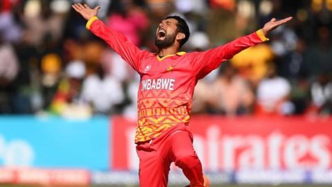 Sikandar Raza celebrates taking a wicket