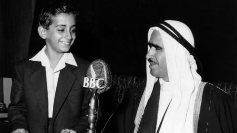 Saqr bin Sultan al-Qassemi of Sharjah, with his son (file photo)