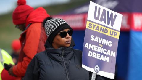 Workers picket outside the Ford Assembly plant as the UAW strike against the Big Three U.S. automakers continues on October 10, 2023 in Chicago.