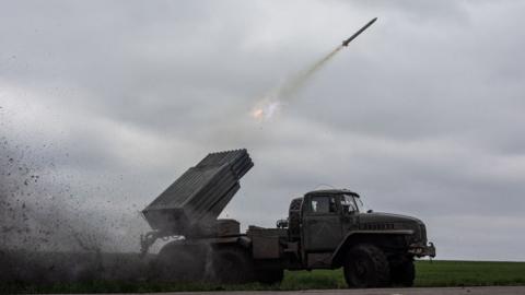A Ukrainian Grad launcher fires a missile