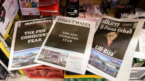Maltese newspapers read "The pen conquers fear" on 22 October 2017 as a common act of defiance following the assassination of journalist Daphne Caruana Galizia