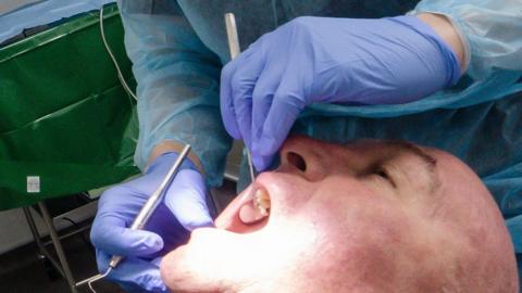 Man given dental treatment