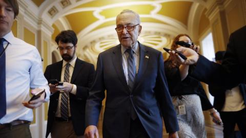 Senate Majority Leader Charles Schumer (D-NY) talks to reporters as he walks to his office at the U.S. Capitol on February 07, 2024 in Washington, DC. In the immediate wake of the failed bipartisan border security and foreign aid legislation, Schumer said he will put up a supplemental spending bill for aid to Israel, Ukraine, and Taiwan up for a vote later on Wednesday.