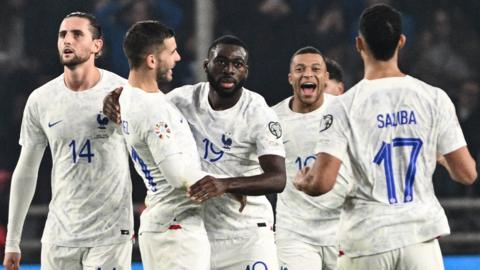 Youssouf Fofana and France celebrate his equalising goal against Greece in Euro 2024 qualifying