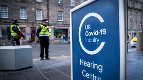 covid inquiry sign