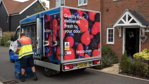 Tesco van delivering to a home