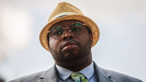 Vauhxx Booker listens during a press conference in Bloomington, Indiana, 2 August 2021