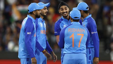 India celebrate a wicket