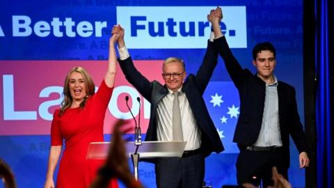 Anthony Albanese celebrating with his wife and son.