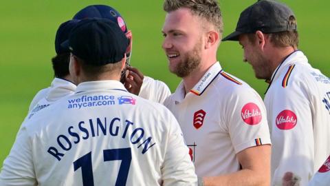 Sam Cook celebrates taking wicket for Essex
