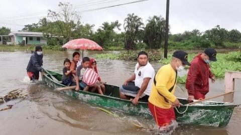 A handout photo made available by the Fire Department of Honduras that shows the rescue work in a flooded area due to Hurricane Eta, in the community of La Masica, Honduras, 02 November 2020.