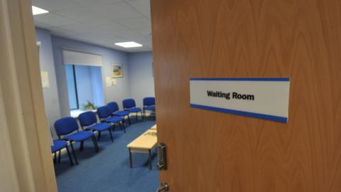 An empty waiting room at a GP surgery