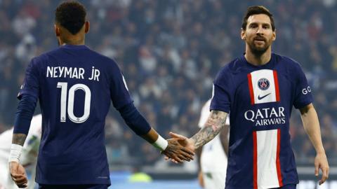 Lionel Messi celebrates with Neymar