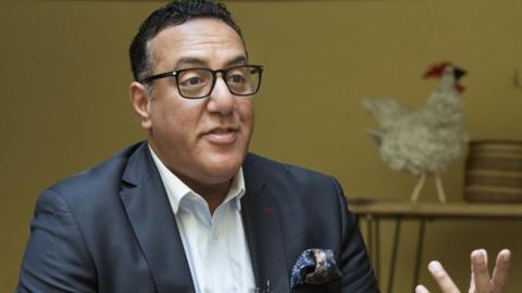 Kenyan minister of Tourism and Wildlife Najib Balala speaks during the Airbnb Africa Travel Summit in Langa township in Cape Town on September 12, 2018.