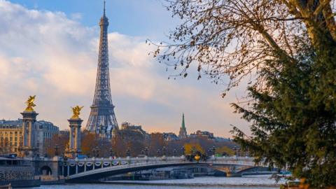 Eiffel Tower seen across the river Seine
