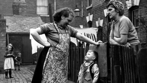Neighbours talking in the street in Birmingham in 1964