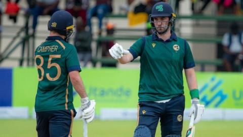 Curtis Campher and Andrew Balbirnie in the middle during Ireland's victory over Zimbabwe in the final ODI