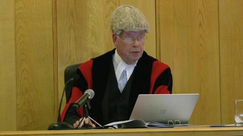 A judge handing down judgement