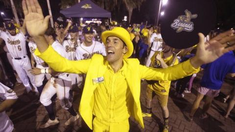 Banana owner Jessie Cole leads a dance party after a Banana Ball game