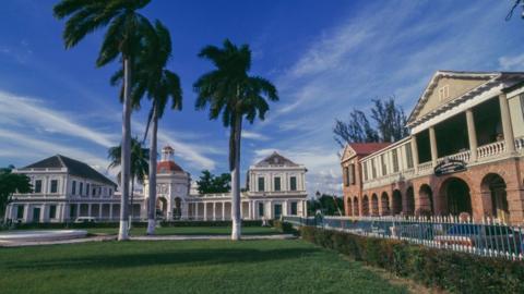 Jamaica. The main square of Spanish Town with the Parliament building on the right and the Rodney Memorial on the left