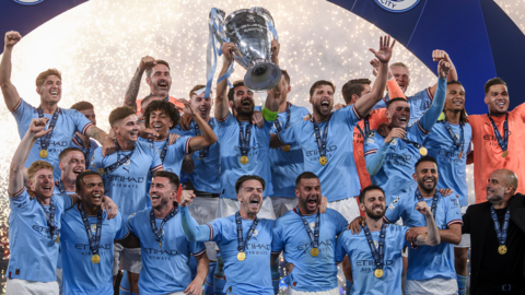 Manchester City's players celebrate winning the Champions League in 2022-23