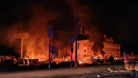 Buildings burning following Russian strikes on Kharkiv