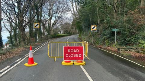 Road closed sign at the Ramsey hairpin