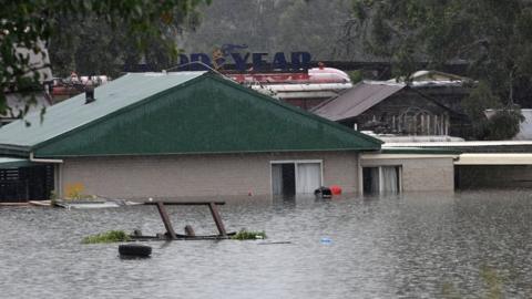 A group of houses partially submerged