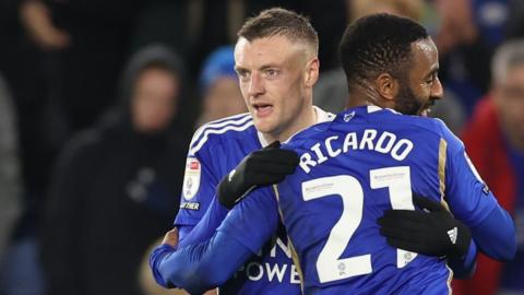 Jamie Vardy, of Leicester City, scores a goal and celebrates with team-mate Ricardo Pereira