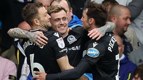 Sammie Szmodics celebrates with team-mates after scoring against Leeds
