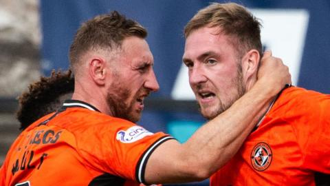 Dundee United scorers Louis Moult and Kevin Holt celebrate