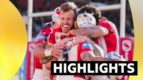 Catalans players celebrate a try against Hull KR