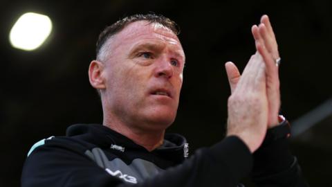 Newport County boss Graham Coughlan applauds