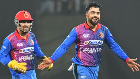 Afghanistan's Rashid Khan celebrates a wicket in a previous series