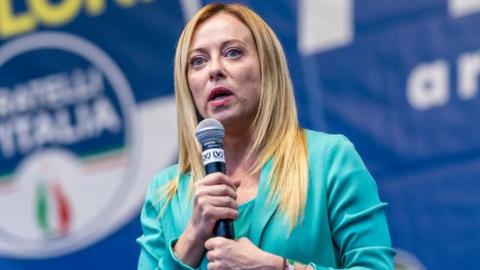 Giorgia Meloni of Fratelli d'Italia political party, member of right-wing coalition speaks to supporters in turin, Italy.