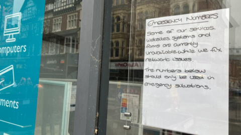 An image of a sign in Leicester informing residents of a cyber attack