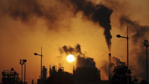 Smoke billows from chimneys at a chemical factory in Hefei, China. Archive photo