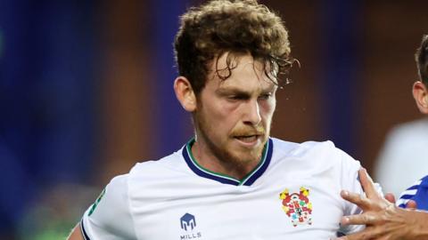 Dan Pike of Tranmere Rovers during the Carabao Cup Second Round match between Tranmere Rovers and Leicester City at Prenton Park on August 29, 2023 in Birkenhead, England