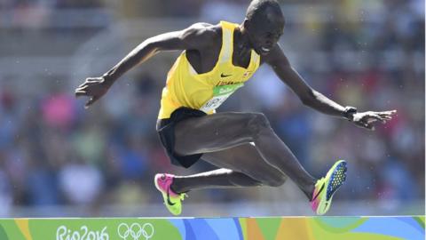 Uganda's Benjamin Kiplagat competes in the Men's 3000m Steeplechase Round 1 during the athletics event at the Rio 2016 Olympic Games at the Olympic Stadium in Rio de Janeiro on August 15, 2016.