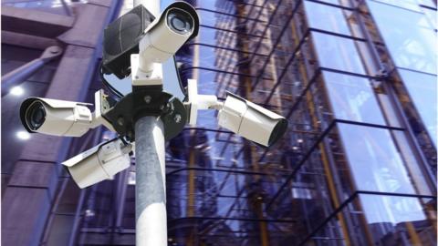 Surveillance camera in city