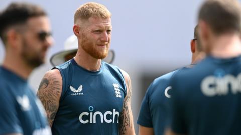 England captain Ben Stokes looks on during training