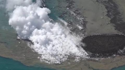 Smoke comes from new Japanese island