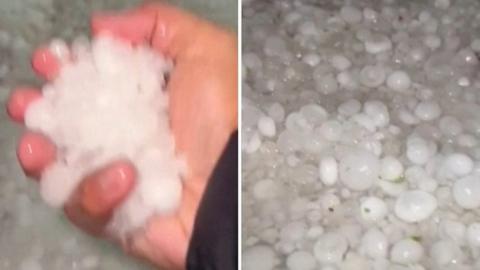 Large hailstones, with hand holding hailstones