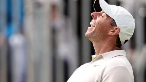 Rory McIlroy reacts after holing the winning putt at the Scottish Open