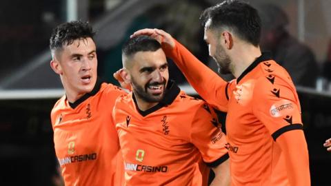 Dundee United squad celebrate as Aziz Behich makes it 1-0 during a cinch Premiership match between Dundee United and Aberdeen at Tannadice,