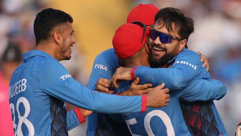 Rashid Khan of Afghanistan celebrates the wicket of Dhananjaya de Silva of Sri Lanka during the ICC Men's Cricket World Cup India 2023 between Afghanistan and Sri Lanka at MCA International Stadium on October 30, 2023 in Pune, India.