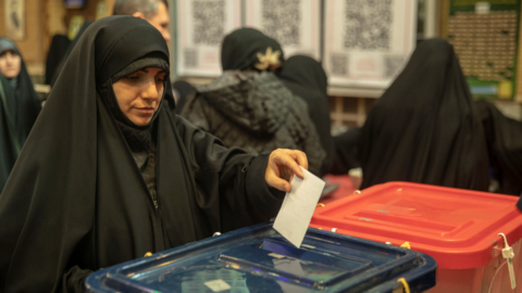 Iranian people cast their votes for 12th term of the parliamentary elections and the 6th term of the Assembly of Leadership Experts at a polling station