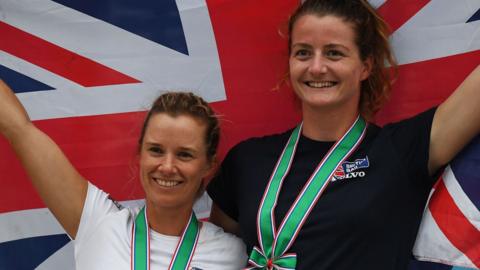 Hannah Mills and Eilidh McIntrye after winning gold at the Tokyo Olympics test event 2019