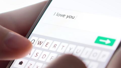 Phone with 'I love you' message