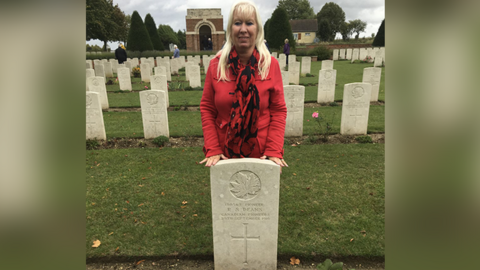 Gwyneth Jones behind grave